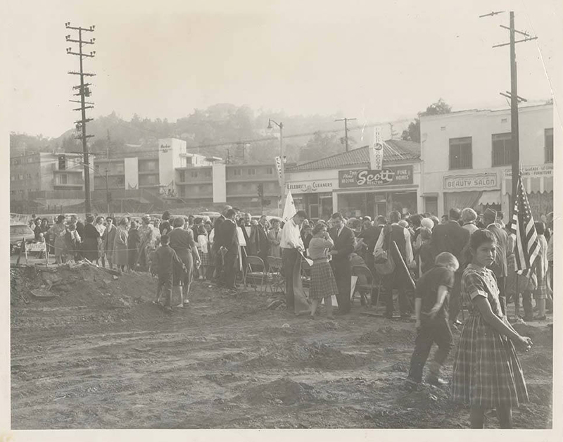 Photograph shows a crowd gathered for a ground breaking at the site of the future Campo de Cahuenga