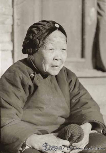 Elderly woman in Tientsin China, winter 1946