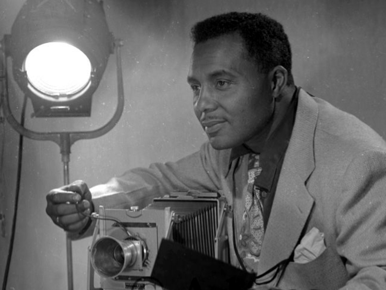 Harry Adams holding a can.
