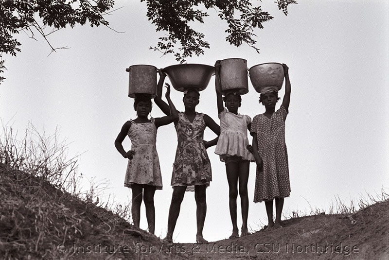 Girls carrying water. Palenque de San Basilio, Colombia, 1978