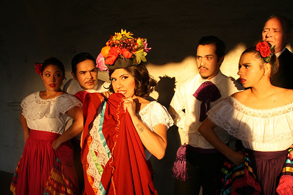 People in ethnic dance costumes