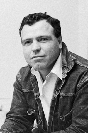 John Kouns wearing a denim jacket.