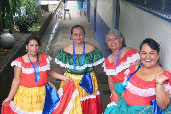 Women from repopulated communities of Chalatenango prepare for folk dance in festival in Guarjila, Chalatenango, El Salvador