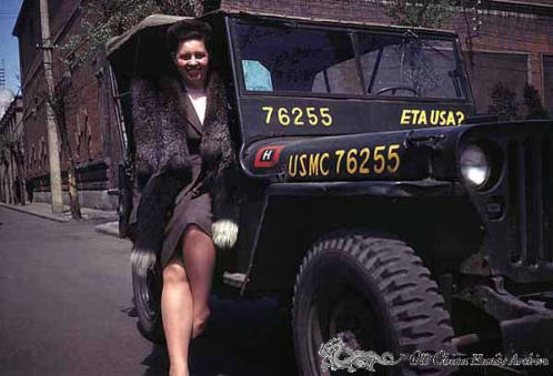 Ludmilla Luvdorski poses with military jeep