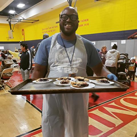 Michael Agyin at a Thanksgiving event