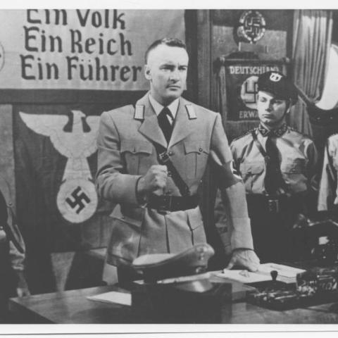Photograph of men dressed in Nazi attire