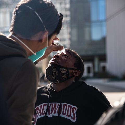 Black woman whose eyes were maced is treated