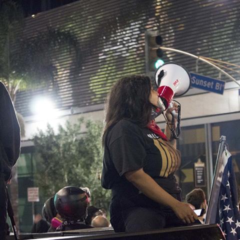 A protester with a megaphone