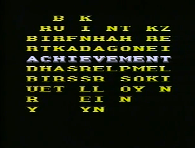 Yellow letters on black background with white letters in middle spelling Achievement